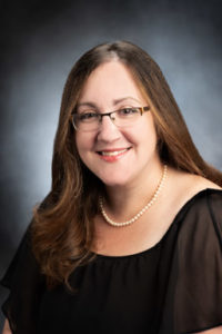 Headshot of Melanie Dominick, Music Director for the Suffolk Concert Choir